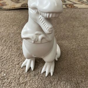 White dinosaur cookie jar.